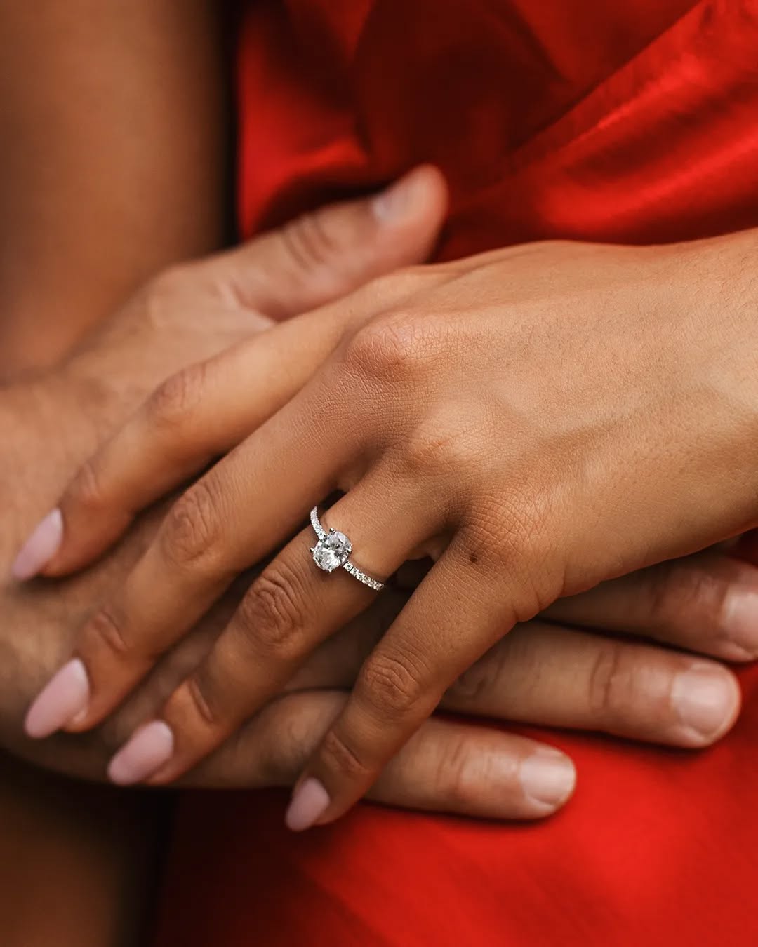 Candid couple laughing together in garden setting